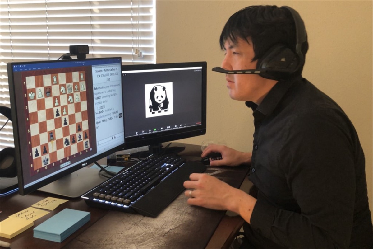 Jeffrey Ashton teaching an online chess class, the Panda Chess Academy logo on screen
